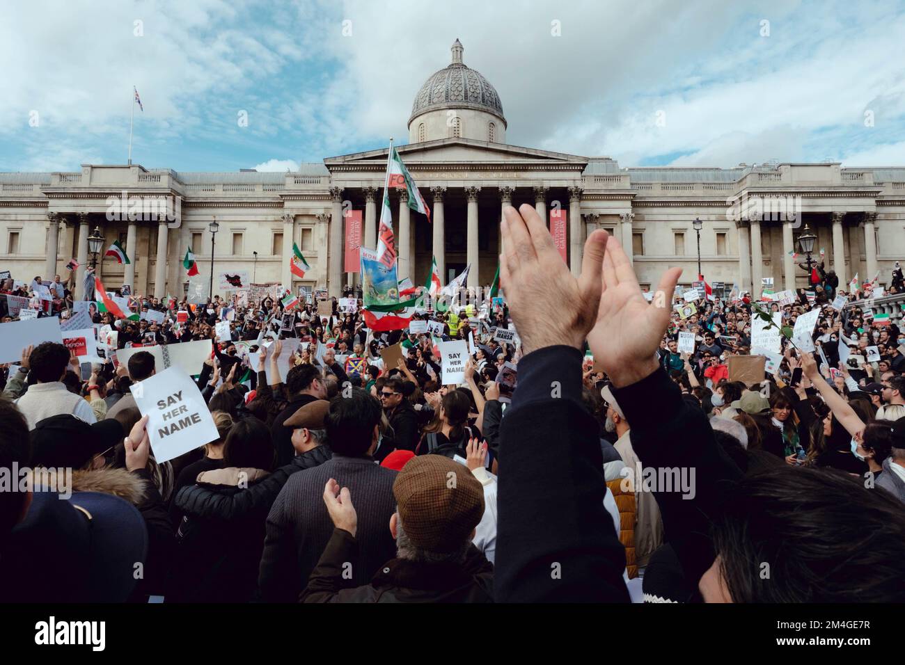 London, UK. 1 OCT, 2022. Iranian people and supporters gathered in Trafalgar Square to protest Iran's regime over the death of Mahsa Amini, who died in police custody in Iran after being detained for allegedly not wearing a head scarf (hijab). Stock Photo