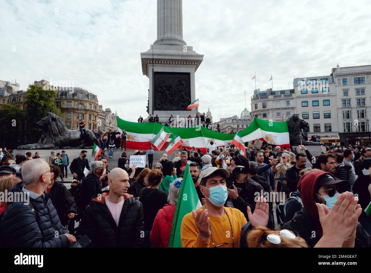 London, UK. 1 OCT, 2022. Iranian people and supporters gathered in Trafalgar Square to protest Iran's regime over the death of Mahsa Amini, who died in police custody in Iran after being detained for allegedly not wearing a head scarf (hijab). Stock Photo