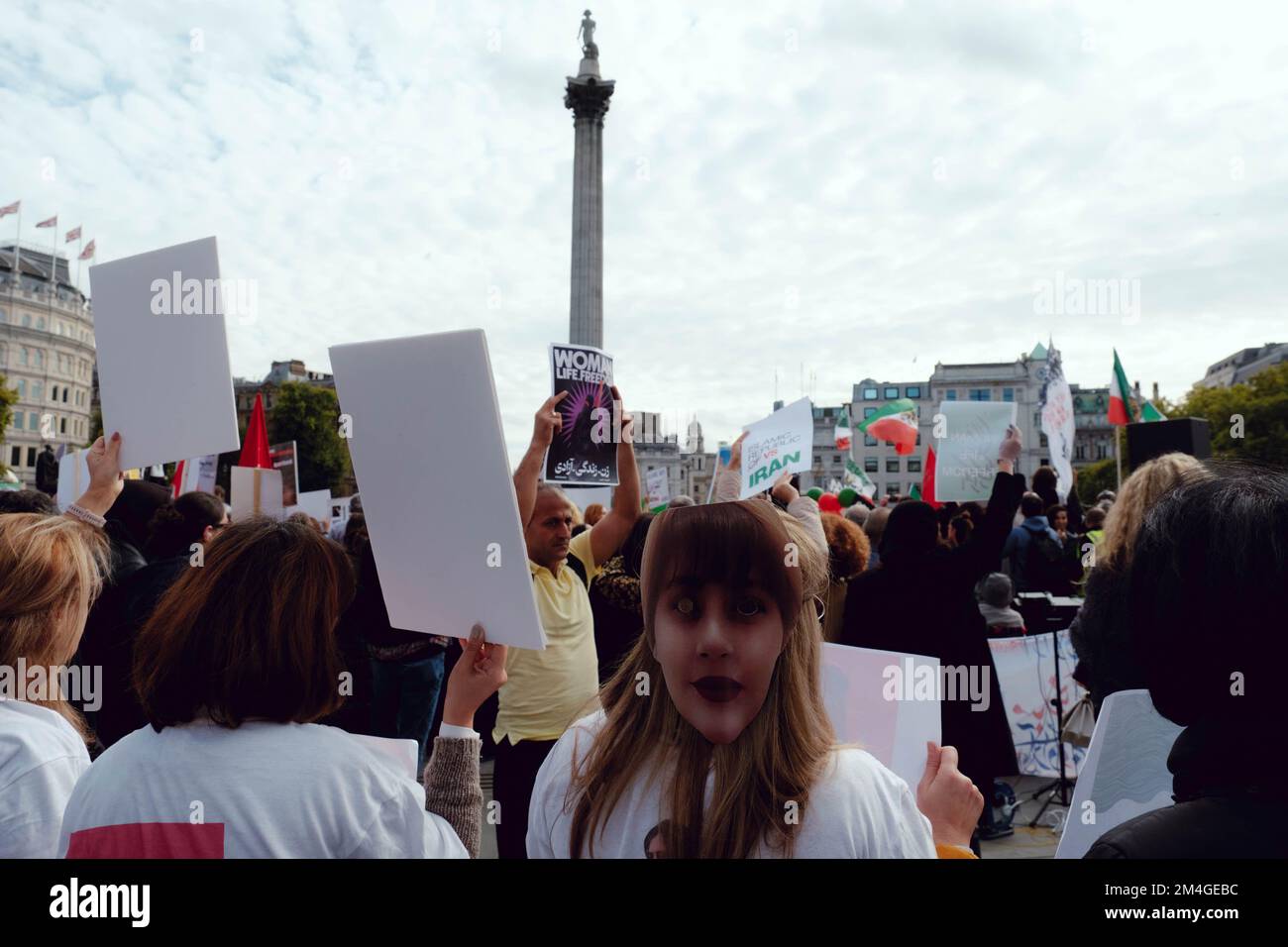 London, UK. 1 OCT, 2022. Iranian people and supporters gathered in Trafalgar Square to protest Iran's regime over the death of Mahsa Amini, who died in police custody in Iran after being detained for allegedly not wearing a head scarf (hijab). Stock Photo