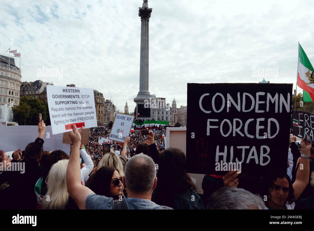 London, UK. 1 OCT, 2022. Iranian people and supporters gathered in Trafalgar Square to protest Iran's regime over the death of Mahsa Amini, who died in police custody in Iran after being detained for allegedly not wearing a head scarf (hijab). Stock Photo