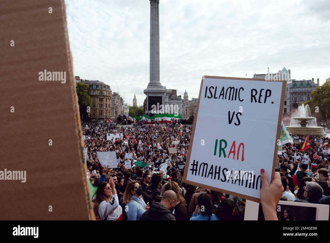 London, UK. 1 OCT, 2022. Iranian people and supporters gathered in Trafalgar Square to protest Iran's regime over the death of Mahsa Amini, who died in police custody in Iran after being detained for allegedly not wearing a head scarf (hijab). Stock Photo