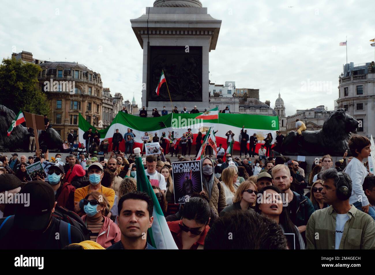 London, UK. 1 OCT, 2022. Iranian people and supporters gathered in Trafalgar Square to protest Iran's regime over the death of Mahsa Amini, who died in police custody in Iran after being detained for allegedly not wearing a head scarf (hijab). Stock Photo