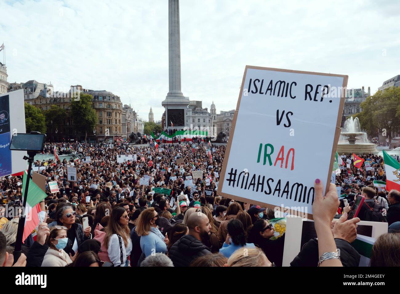 London, UK. 1 OCT, 2022. Iranian people and supporters gathered in Trafalgar Square to protest Iran's regime over the death of Mahsa Amini, who died in police custody in Iran after being detained for allegedly not wearing a head scarf (hijab). Stock Photo