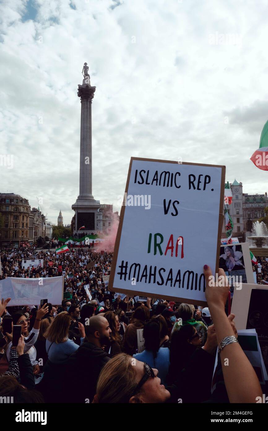 London, UK. 1 OCT, 2022. Iranian people and supporters gathered in Trafalgar Square to protest Iran's regime over the death of Mahsa Amini, who died in police custody in Iran after being detained for allegedly not wearing a head scarf (hijab). Stock Photo