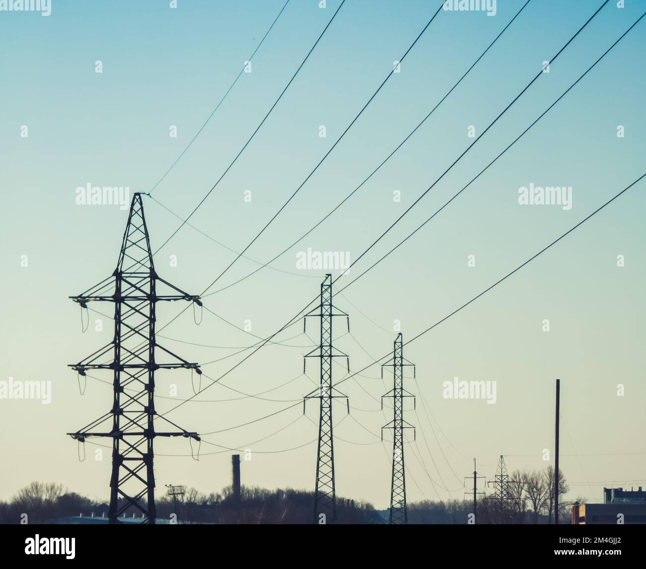 High voltage electricity power line towers against the sky Stock Photo ...
