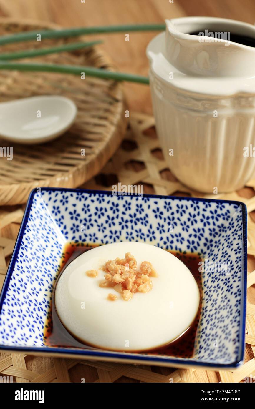 Tofu Pudding or Jimami Tofu . Okinawa Traditional Food. Sprinkle Nuts