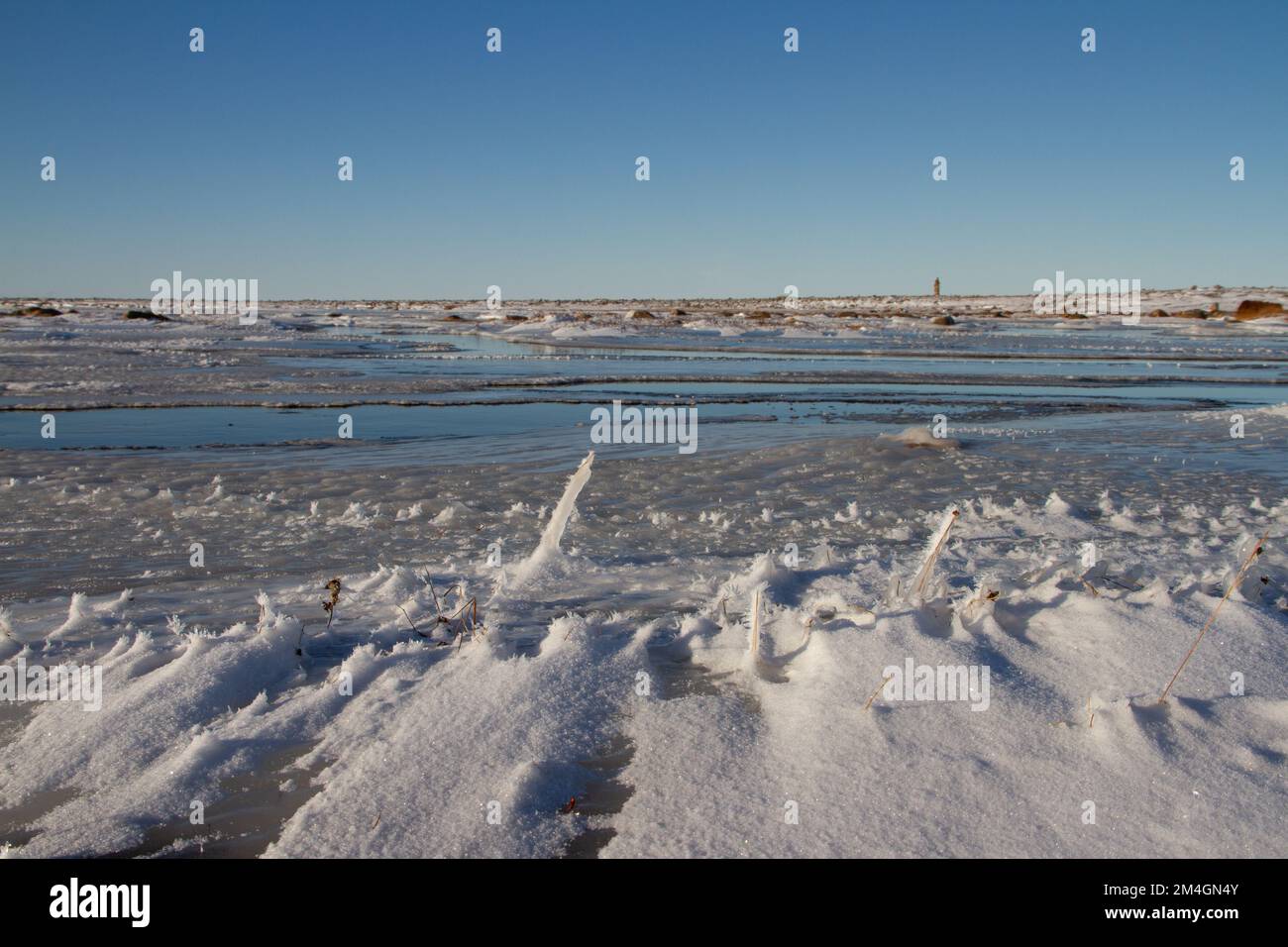 Arctic landscape frozen arctic tundra in Nunavut over a snow covered