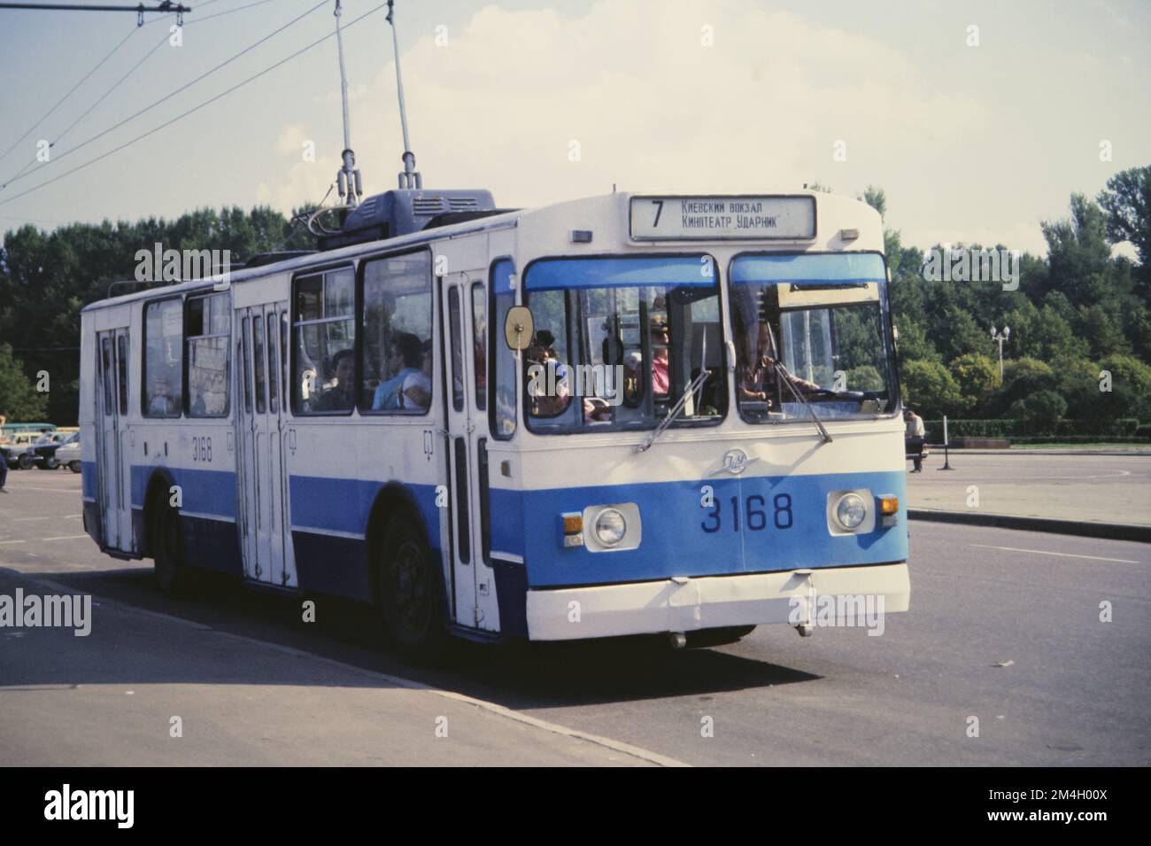 Historic Image Of A ZiU-682V Electric Trolley Manufactured By Trolza Bus Number 3168 With Passengers Used For Public Transport On Route 7 In The Soviet Union Moscow Russia 1990 Stock Photo
