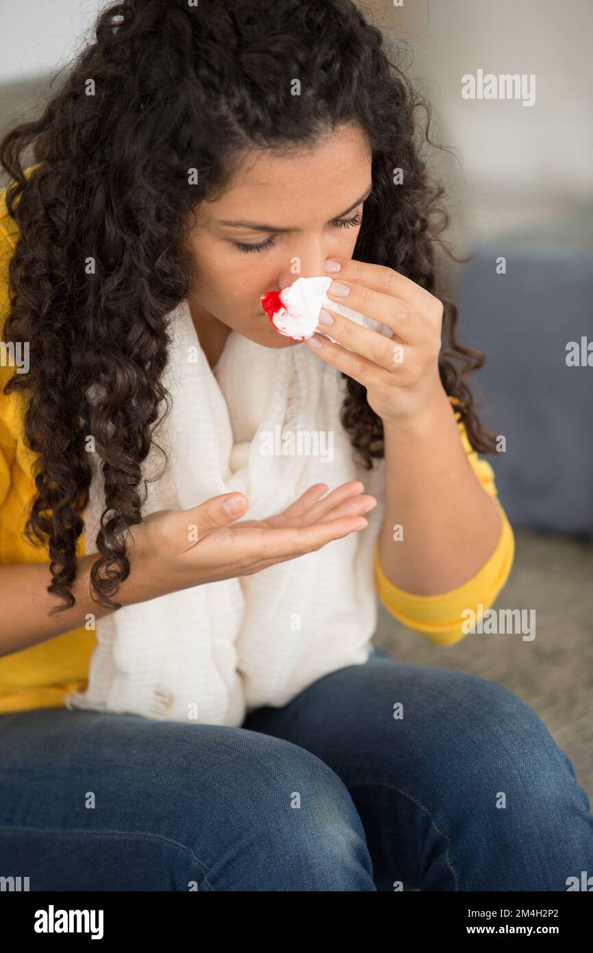 bleeding in the nose and women Stock Photo