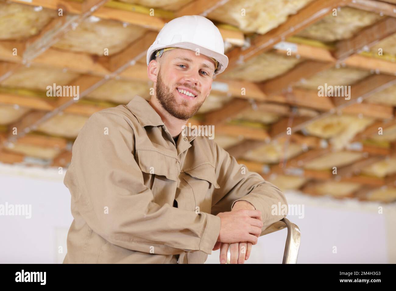 a repairman doing renovation works Stock Photo