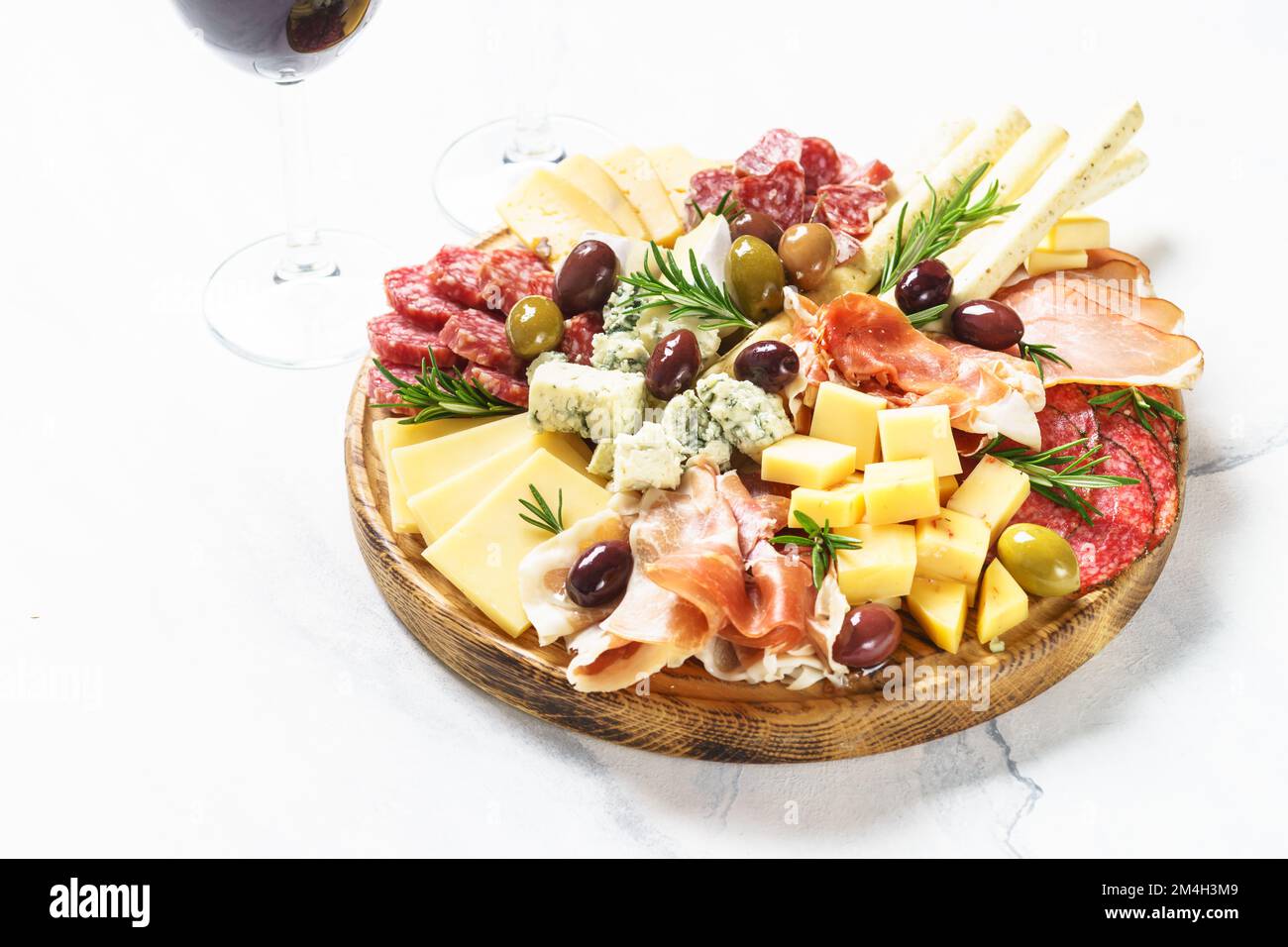 Antipasto platter with jamon, salammi and cheese assortment Stock Photo
