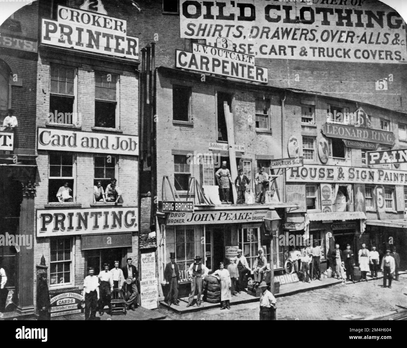 Marcus Ormsbee - Lower Hudson Street, Numbers 2, 3, and 5, New York City, USA - Tradesmen and women outside of their places of work. Stock Photo