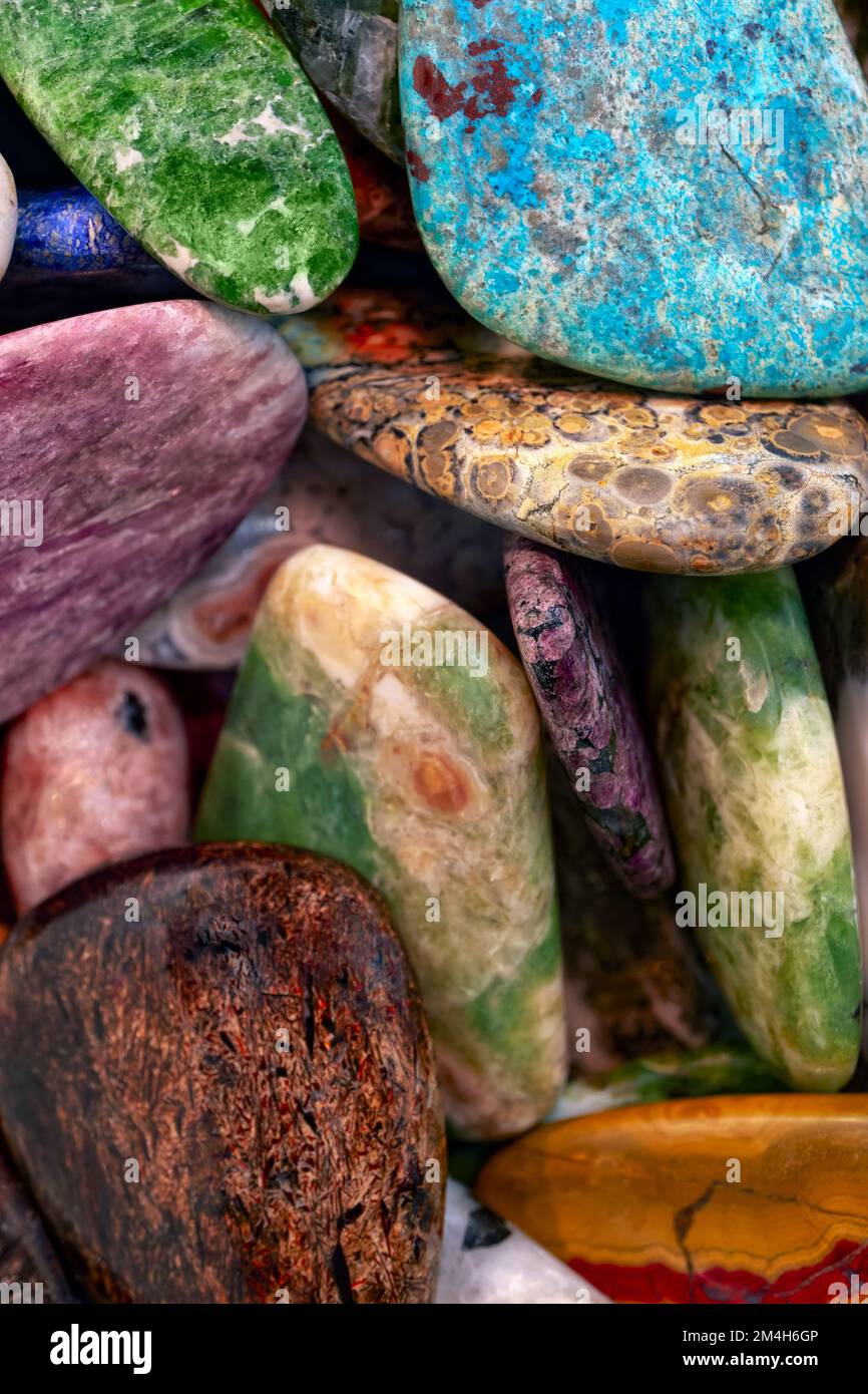 Backgrounds and textures: a lot of multicolored pebbles, various shapes, sizes colours and textures Stock Photo