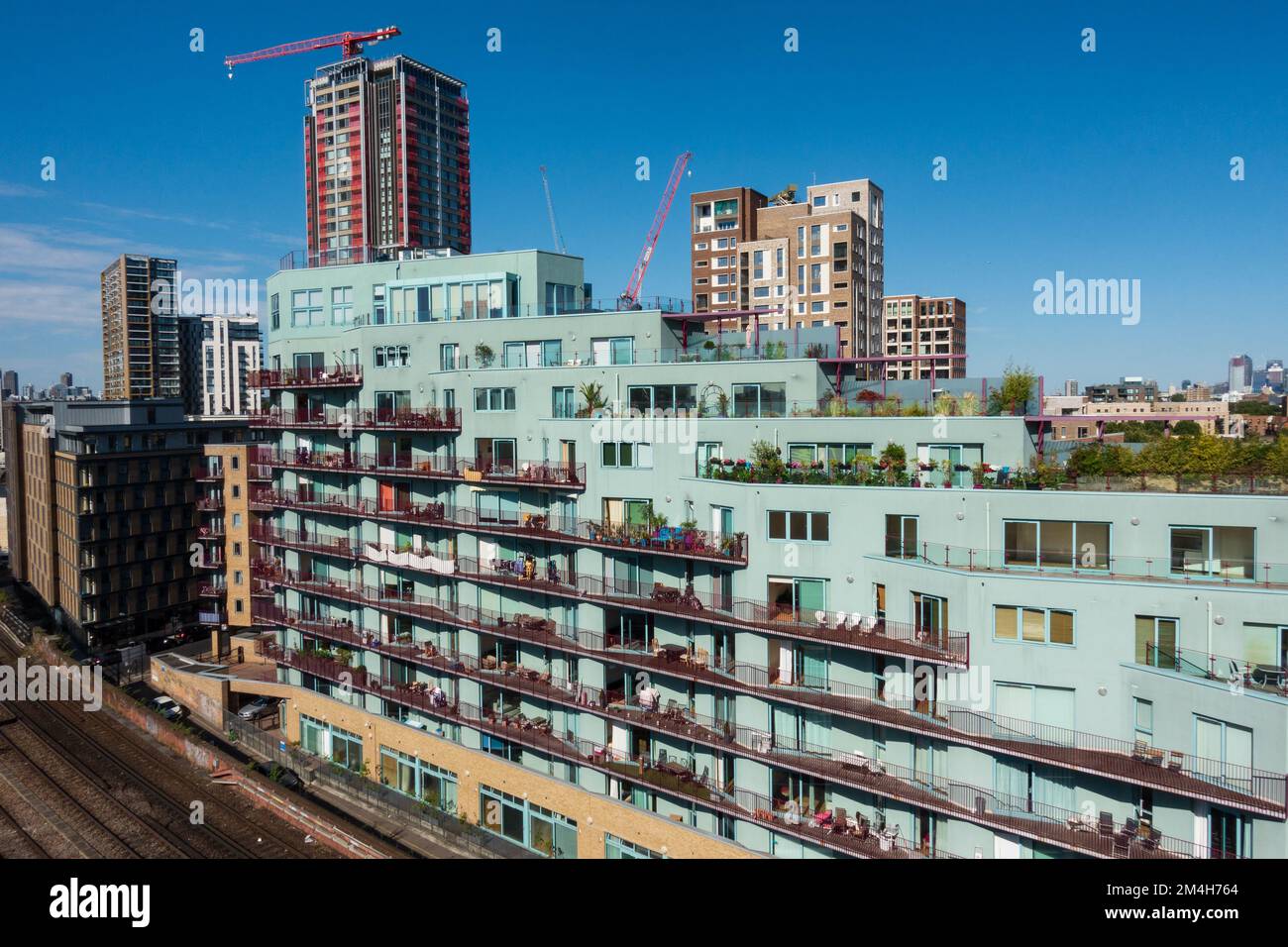 Green apartment block overlooking the elephant and Castle railway line