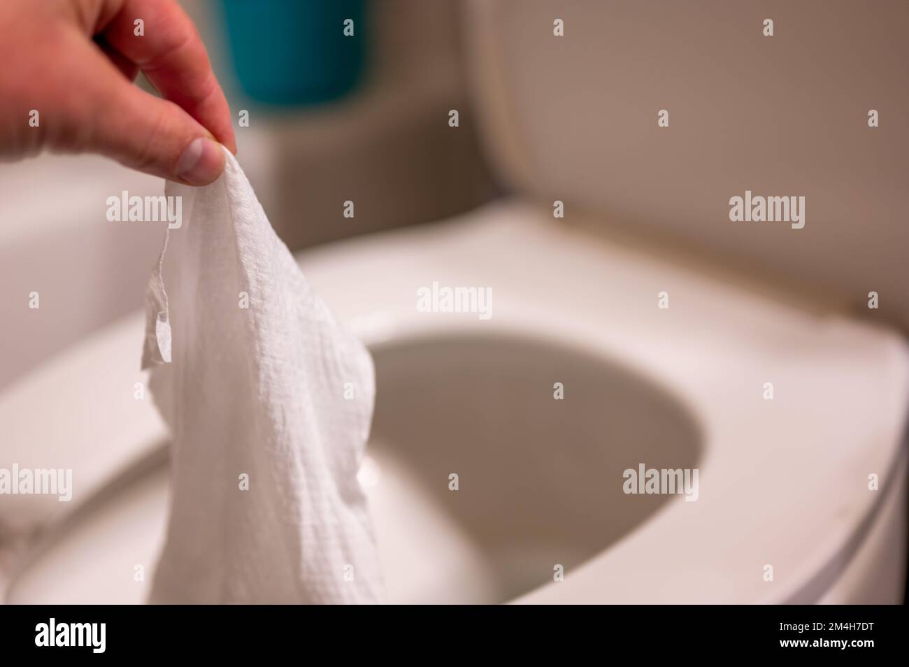 Disposable wipes being flushed down a toilet where they can cause