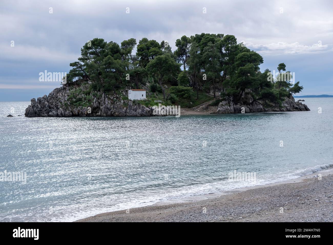 Greece Parga. Panagia island off the coast of Parga, small chapel and ...