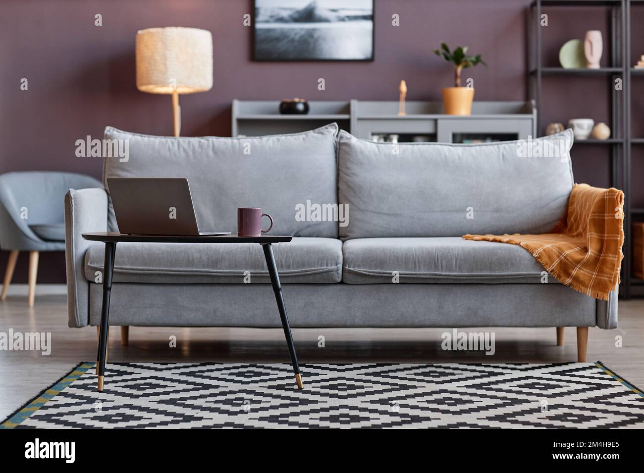 Background image of soft gray couch in elegant home interior with mauve ...