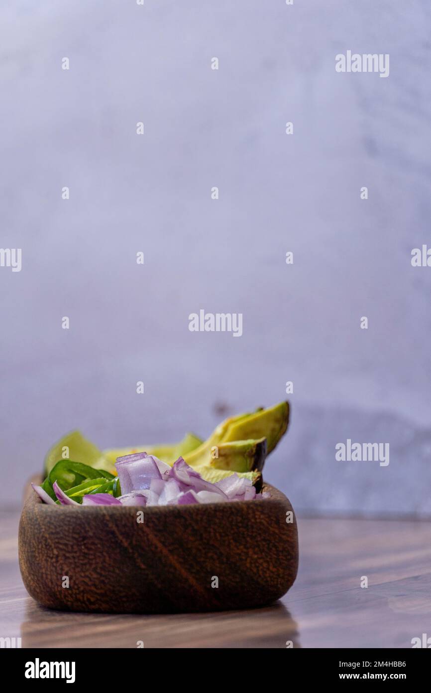 avocado, onion and cilantro, to meat in its juice, typical