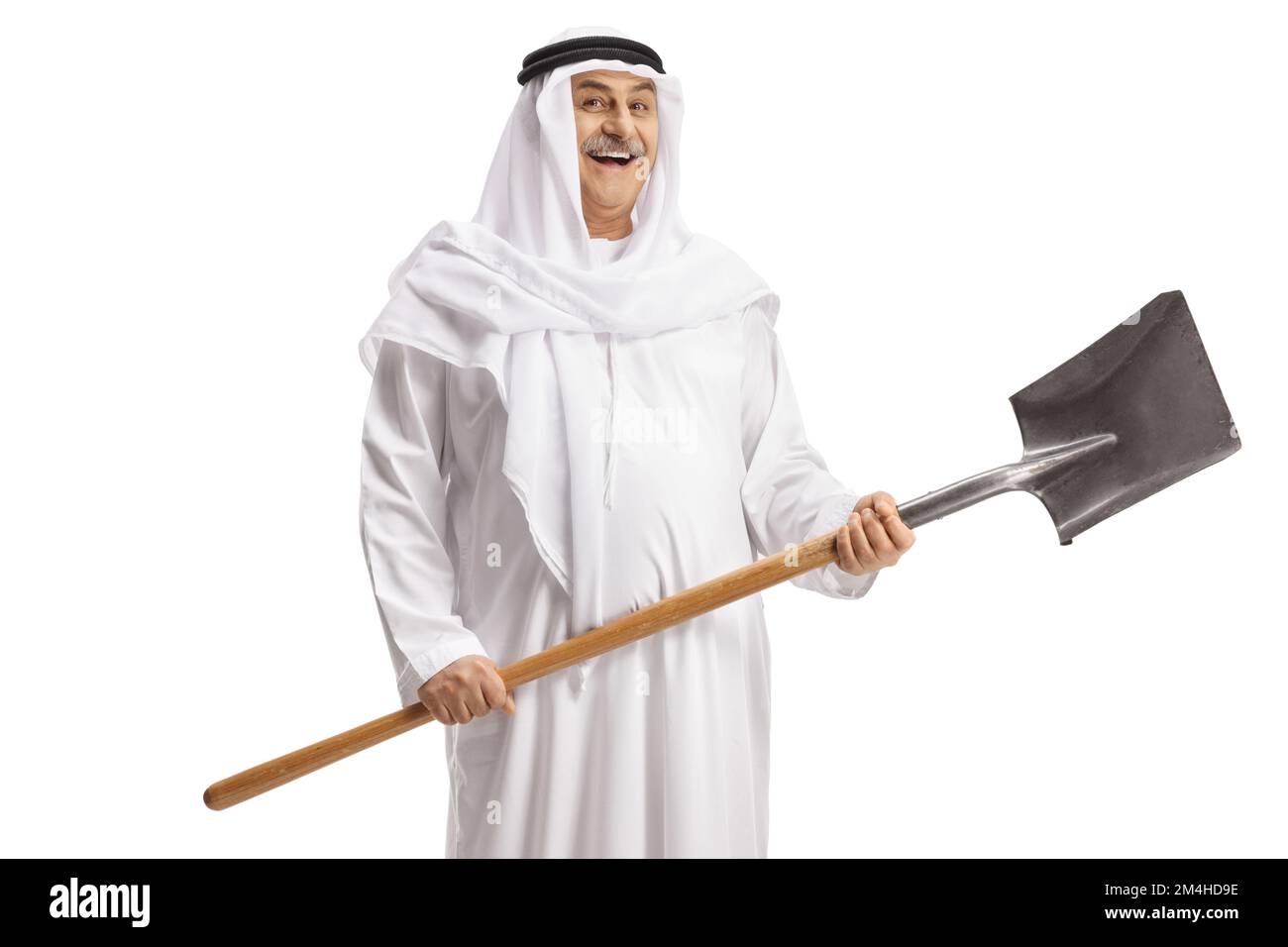 Mature arab man smiling and holding a shovel isolated on white background Stock Photo