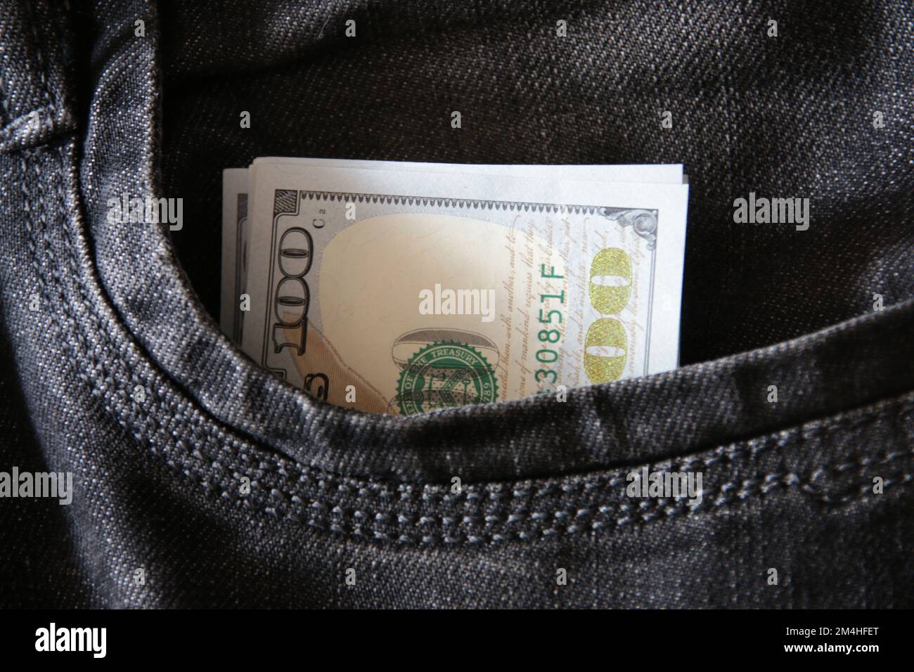 Money in jeans pocket. Profit concept. Stock Photo
