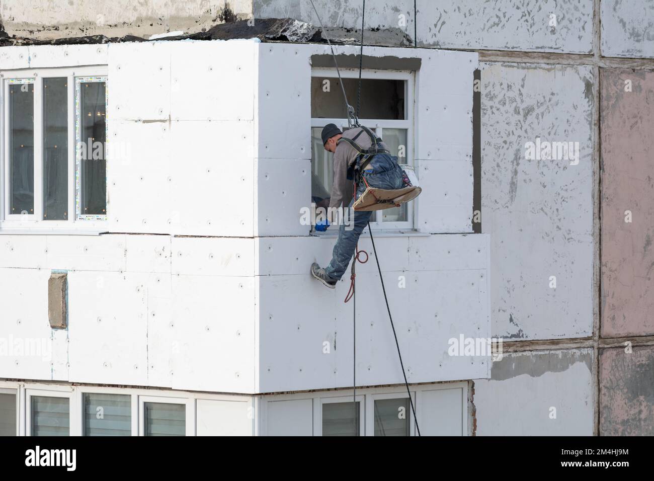 Tiraspol, Moldova - December 10, 2022 High altitude builder sealing