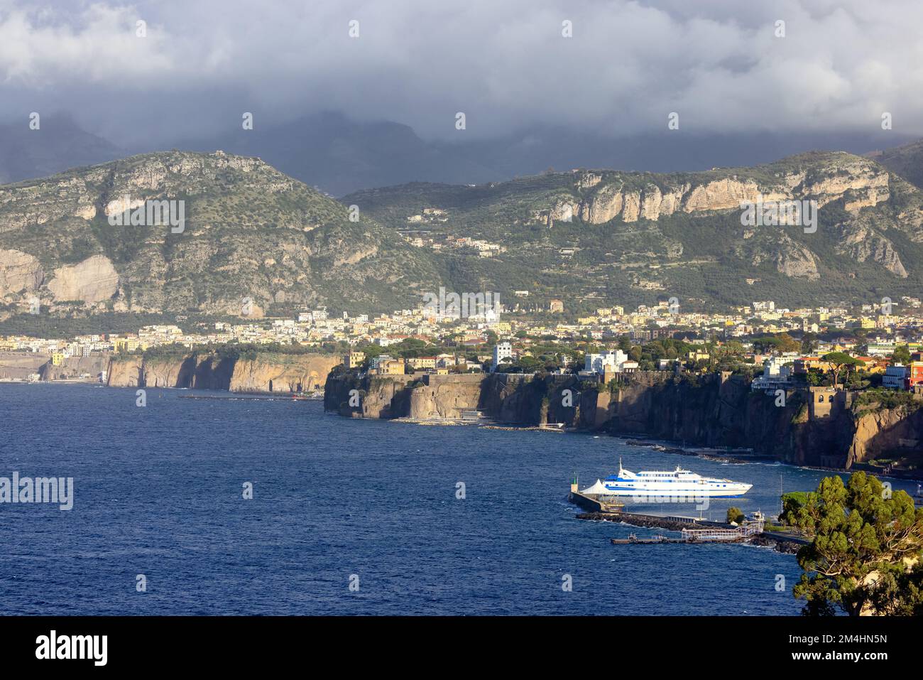 Rocky Coast and Homes in Touristic Town, Sorrento, Italy Stock Photo