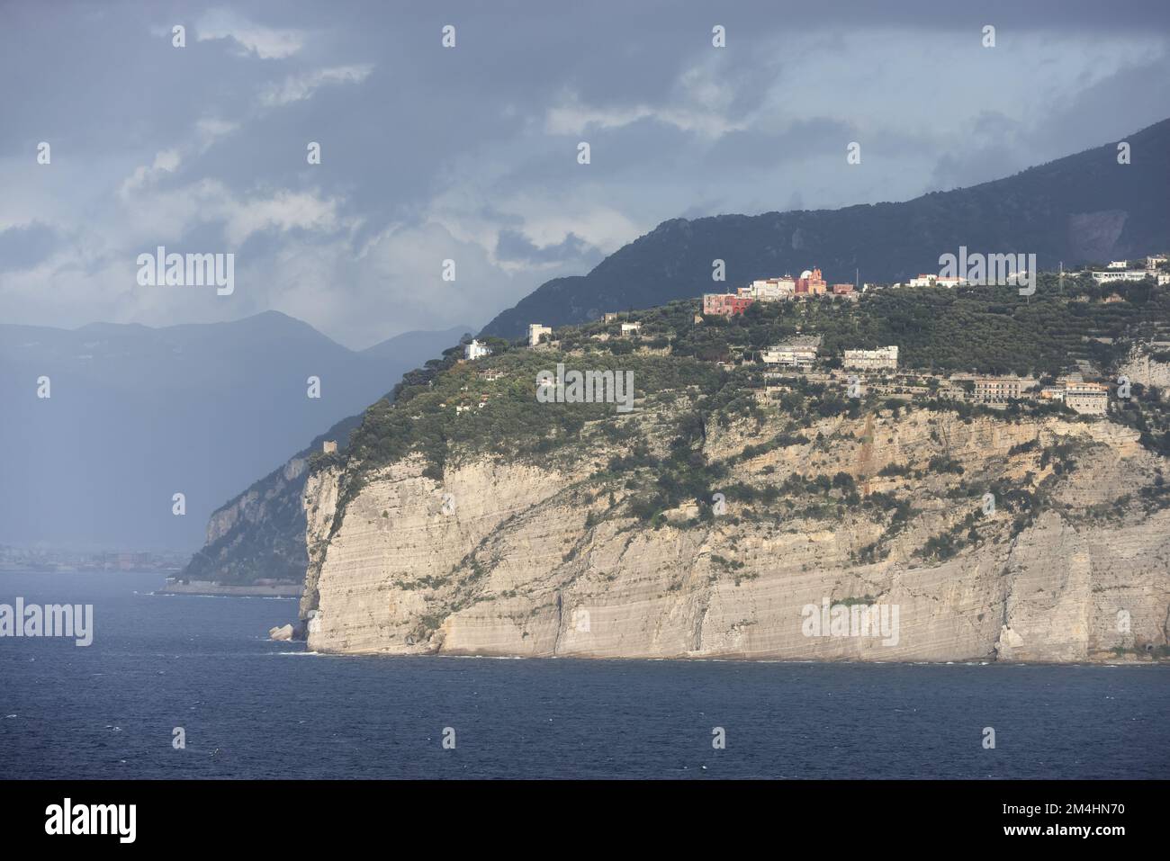 Rocky Coast and Homes in Touristic Town, Sorrento, Italy Stock Photo