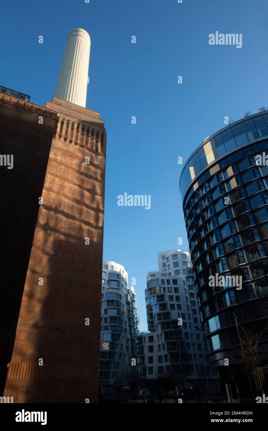 The towers of Battersea Power Station with new build apartment blocks