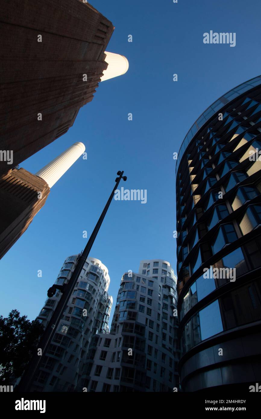 The towers of Battersea Power Station with new build apartment blocks