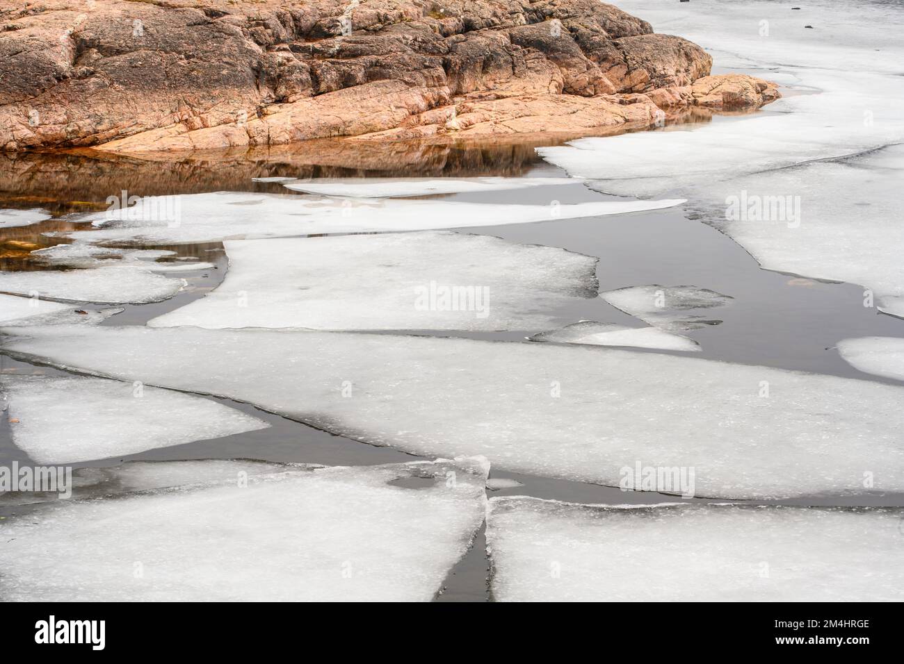 Parry Spring Melting ice, shoreline granite rock on Georgian Bay in early spring ...