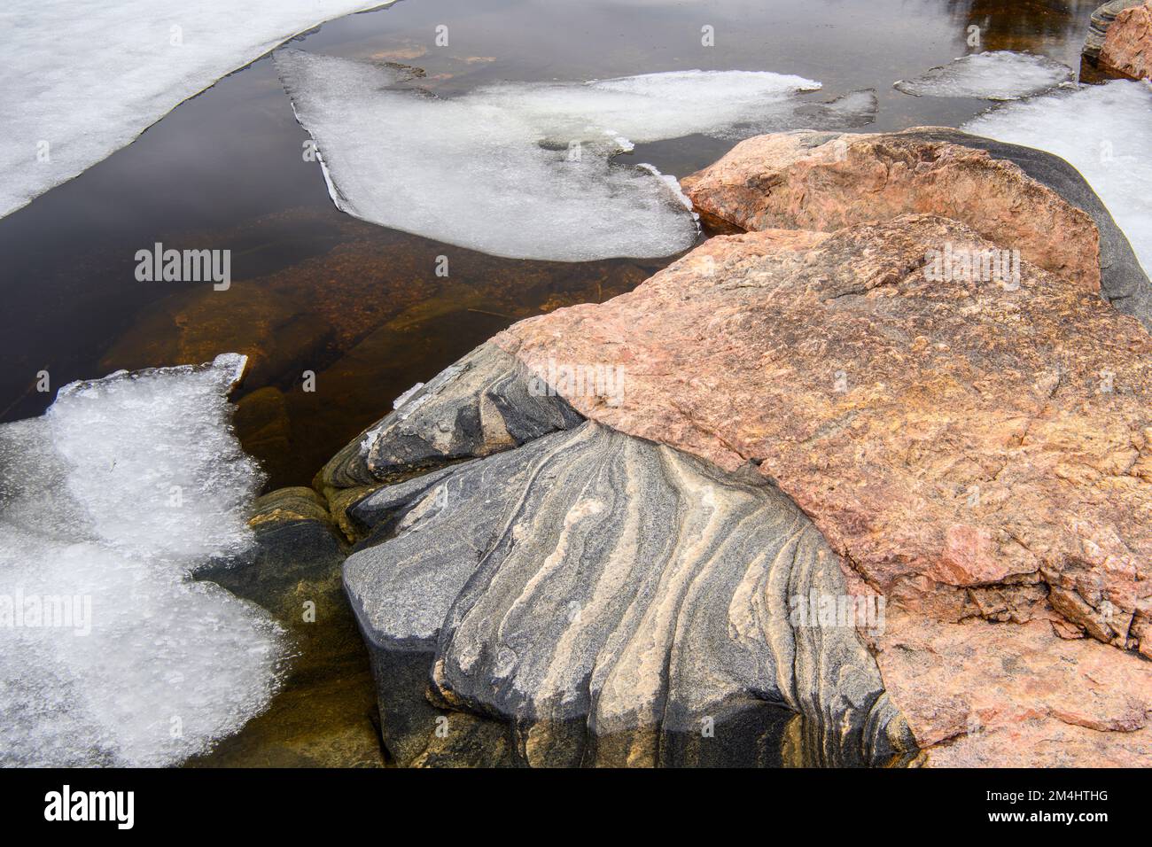Parry Spring Melting ice, shoreline granite rock on Georgian Bay in early spring ...