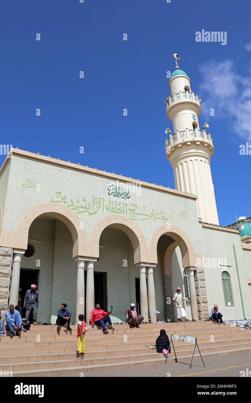 People sitting outside the Great Mosque of Asmara Stock Photo