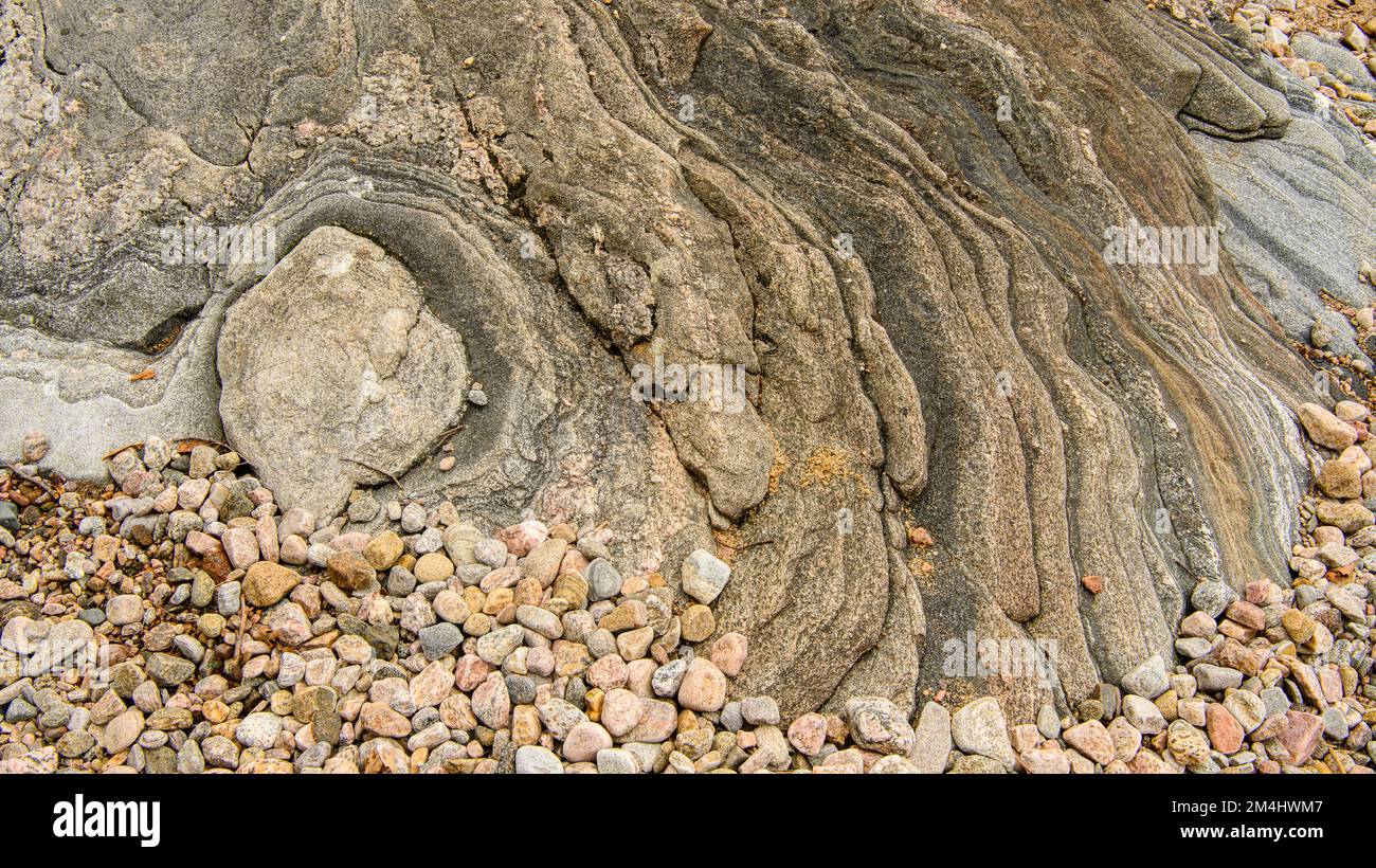Shoreline granite rock, pebbles on Georgian Bay , Parry Sound, Ontario, Canada Stock Photo