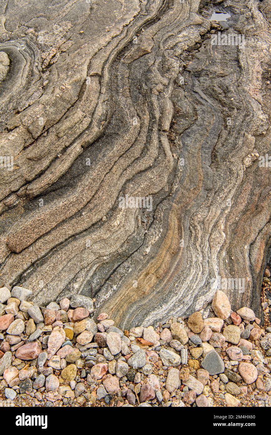 Shoreline granite rock, pebbles on Georgian Bay , Parry Sound, Ontario, Canada Stock Photo