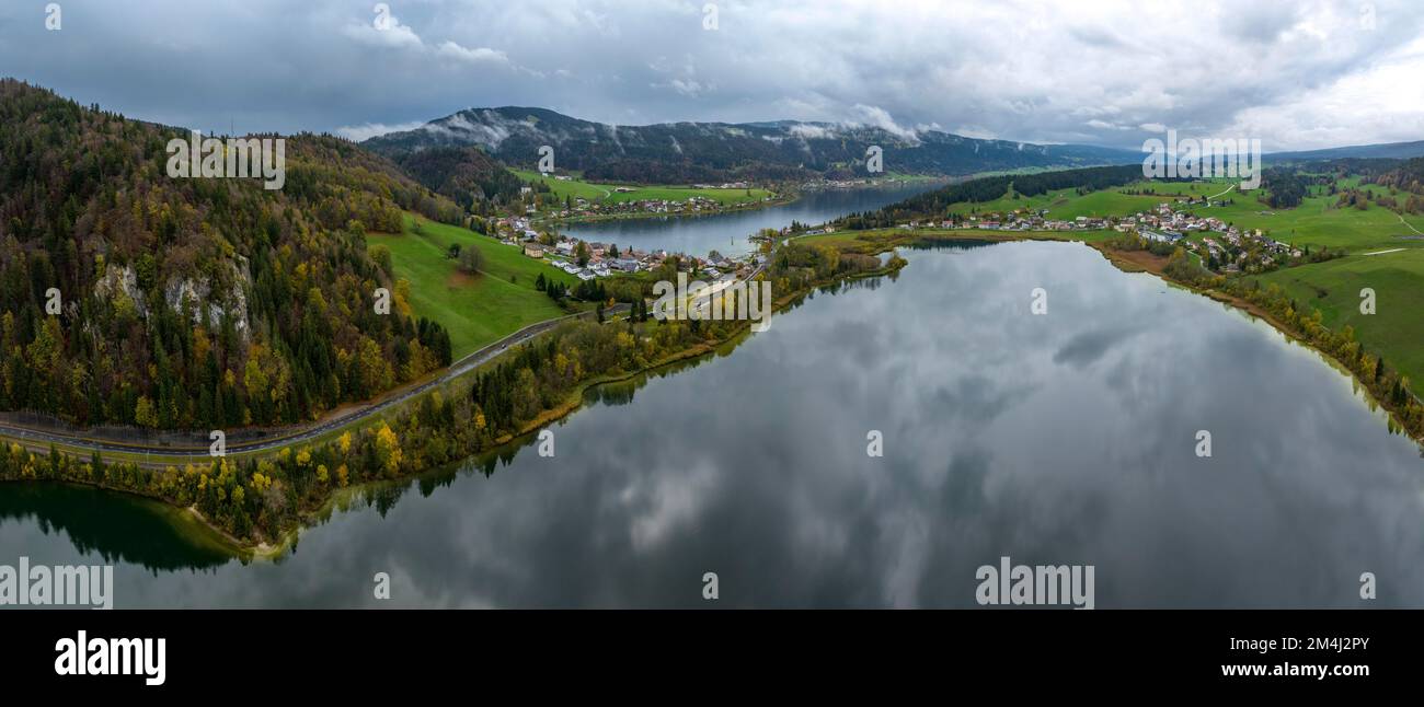 Lac Brenet, Lac de Joux in the back, drone shot in late autumn, Vallee de Joux, Vaud, Switzerland Stock Photo