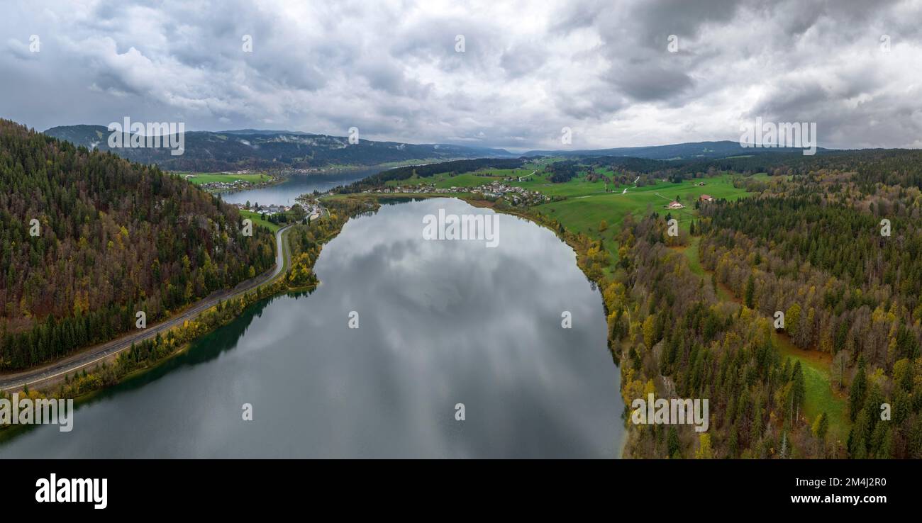 Lac Brenet, Lac de Joux in the back, drone shot in late autumn, Vallee de Joux, Vaud, Switzerland Stock Photo