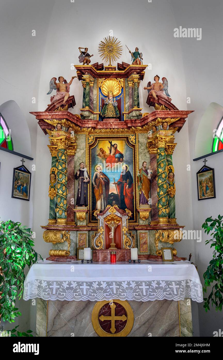 Main altar, Chapel of St. Peter and Paul from 1902, Jungholz-Langenschwand, Tyrol, Austria Stock Photo