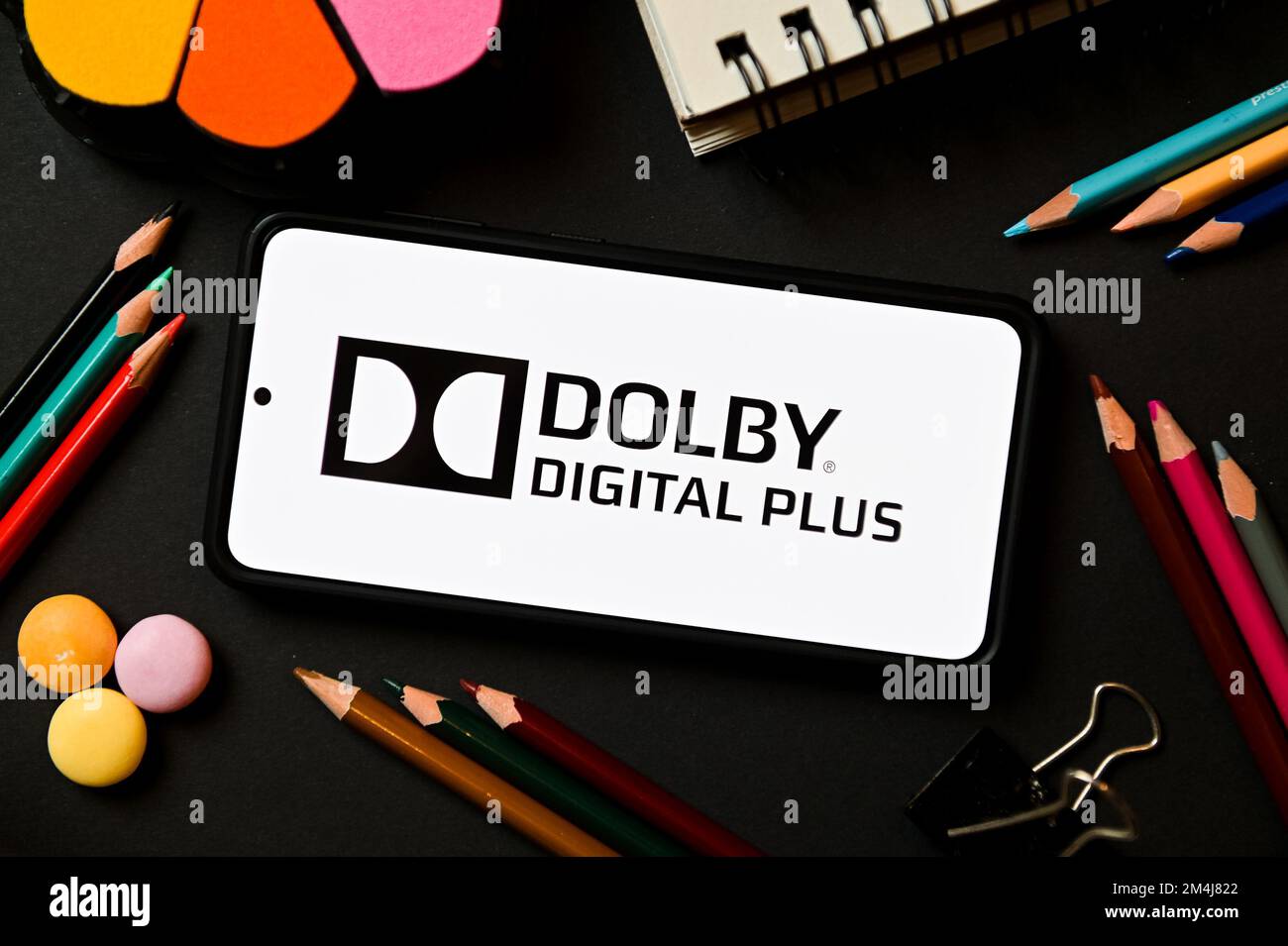 In this photo illustration a Dolby Digital Plus logo seen displayed on a smartphone. Stock Photo