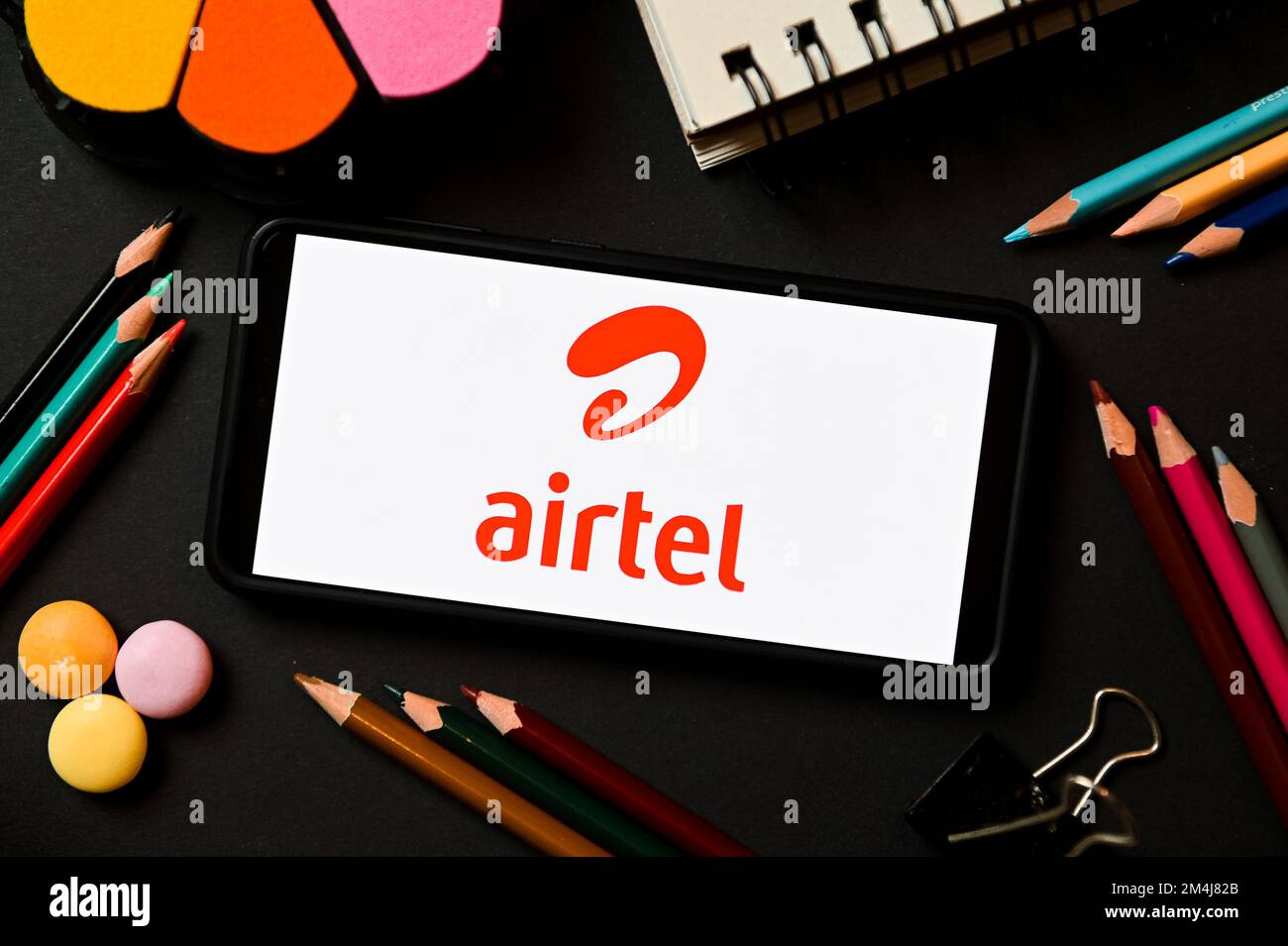 In this photo illustration an Airtel logo seen displayed on a smartphone. Stock Photo