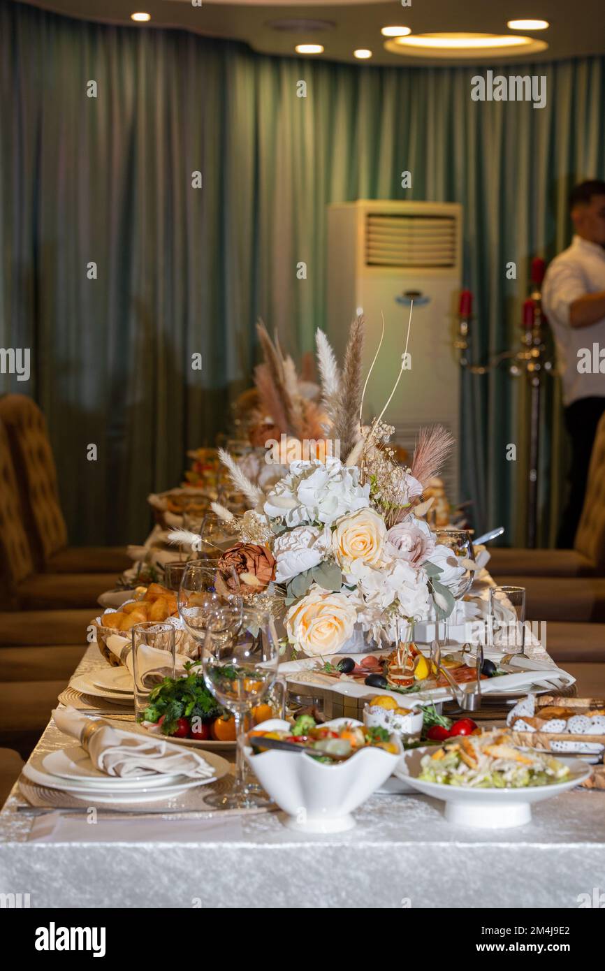 the table in the restaurant is served for a festive event Stock Photo ...