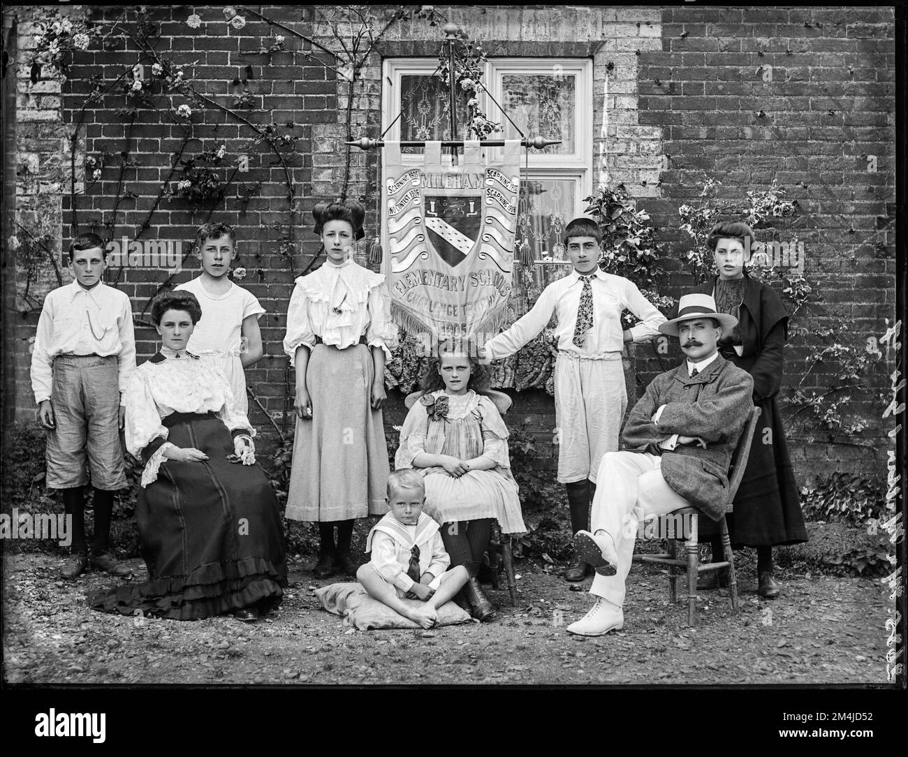 Edwardian or Victorian school photograph showing teachers and some ...