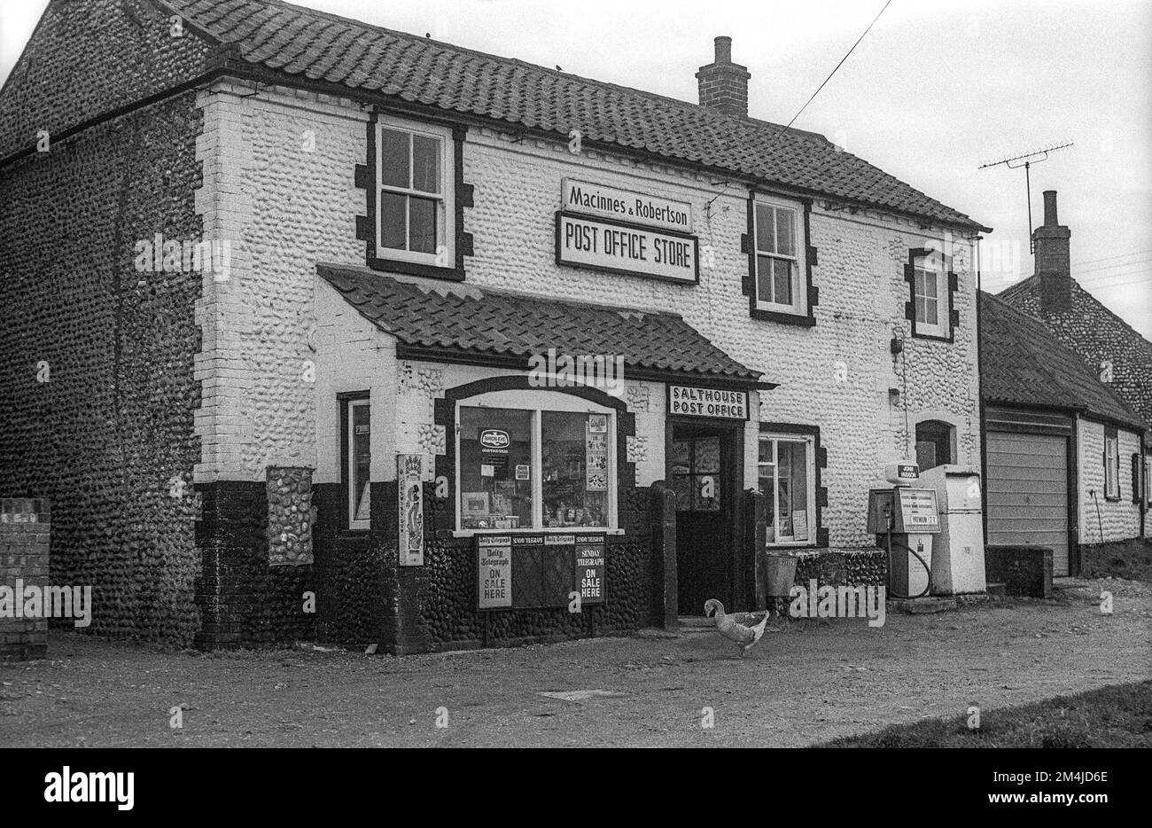 1975 archive photograph of the Post Office and Store at Salthouse on the North Norfolk coast.  The Post Office is now (2022) closed and has become the Old Post Office Shop and Deli. Stock Photo