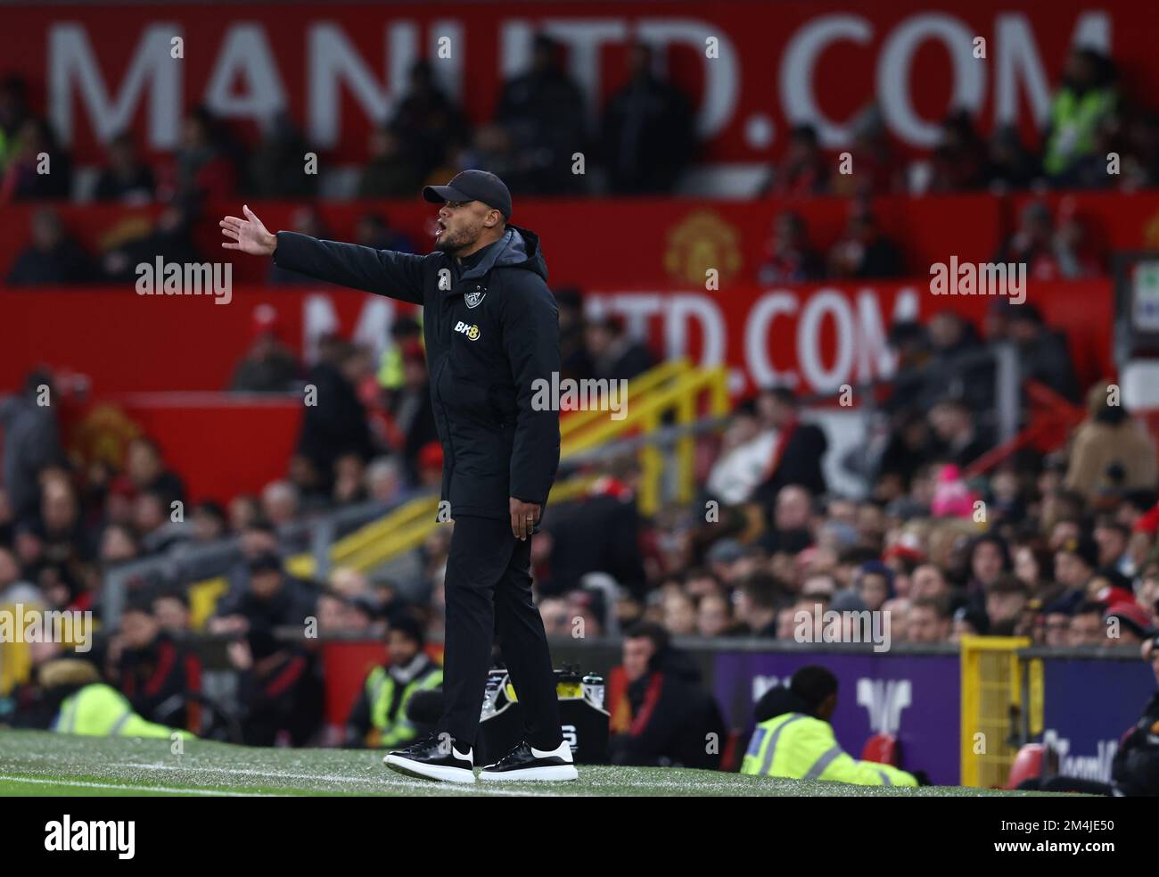 Manchester, England, 21st December 2022.  Vincent Kompany manager of Burnley directs his players during the Carabao Cup Fourth Round match at Old Trafford, Manchester. Picture credit should read: Darren Staples / Sportimage Stock Photo