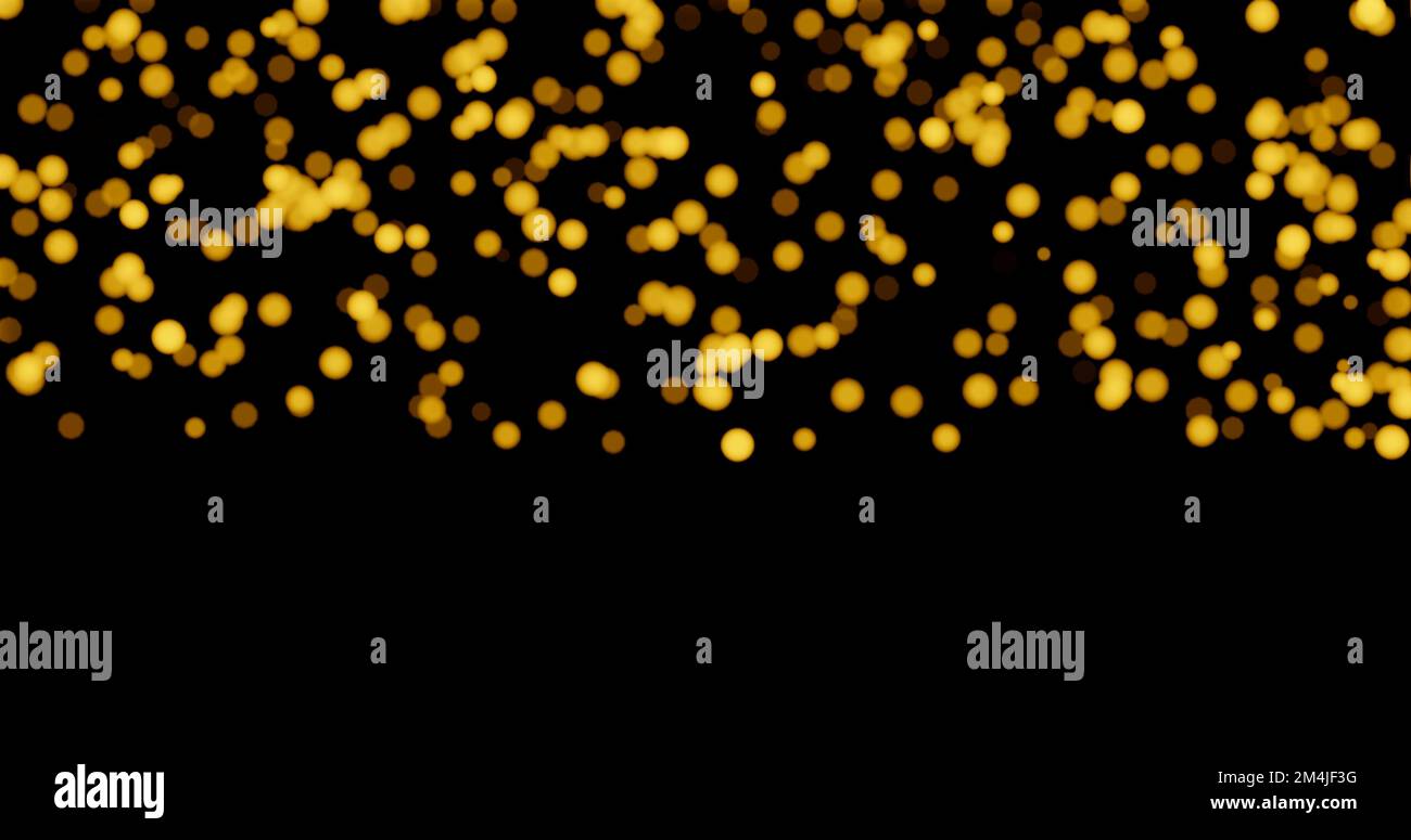 Golden blurred bokeh lights on black background Stock Photo - Alamy