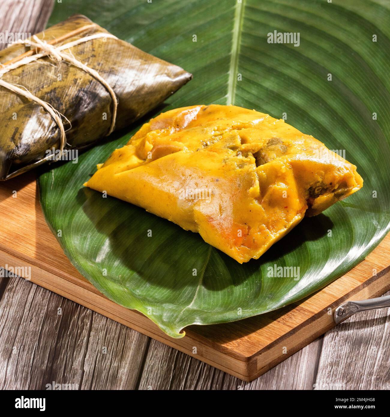 Colombian Tamale recipe with steamed banana leaves Stock Photo Alamy
