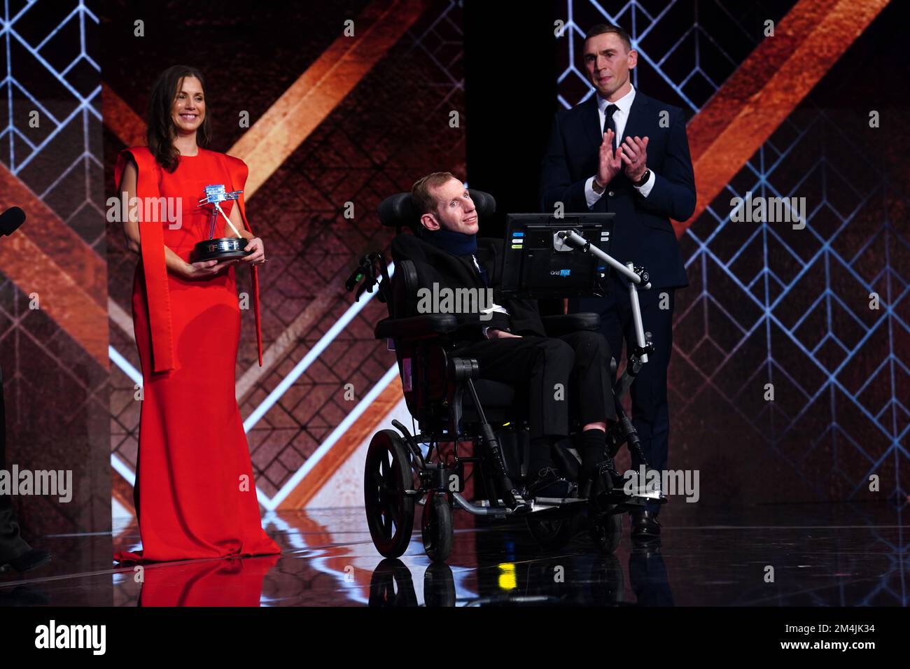 Lindsey Burrow (left) holds her husbands Rob Burrow's Helen Rollason ...