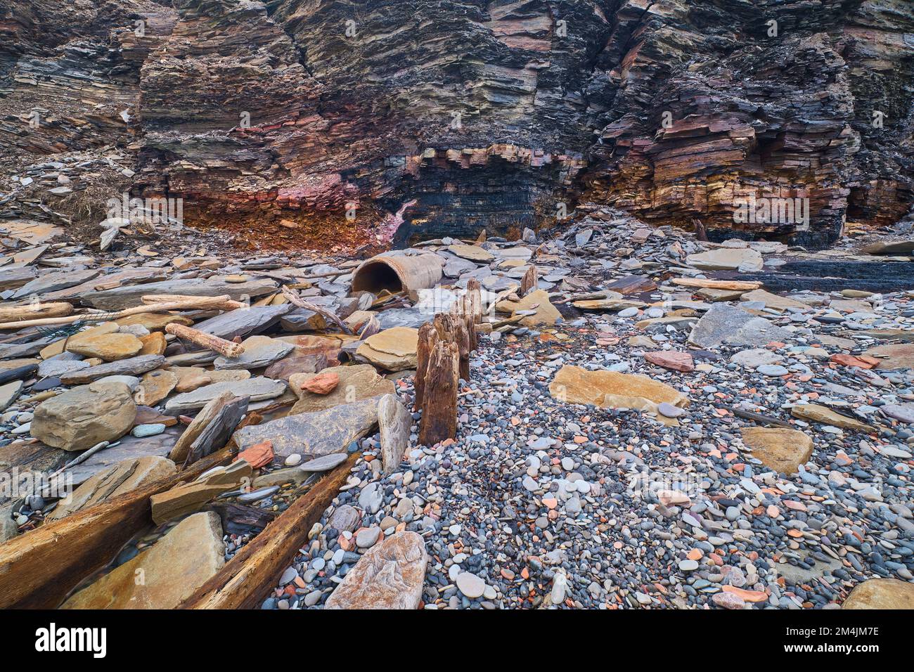 Constant erosion from waves and tides has revealed the remains of Dominion Colliery Number 7.  The hub coal seam in Glace Bay Nova Scotia was first mi Stock Photo