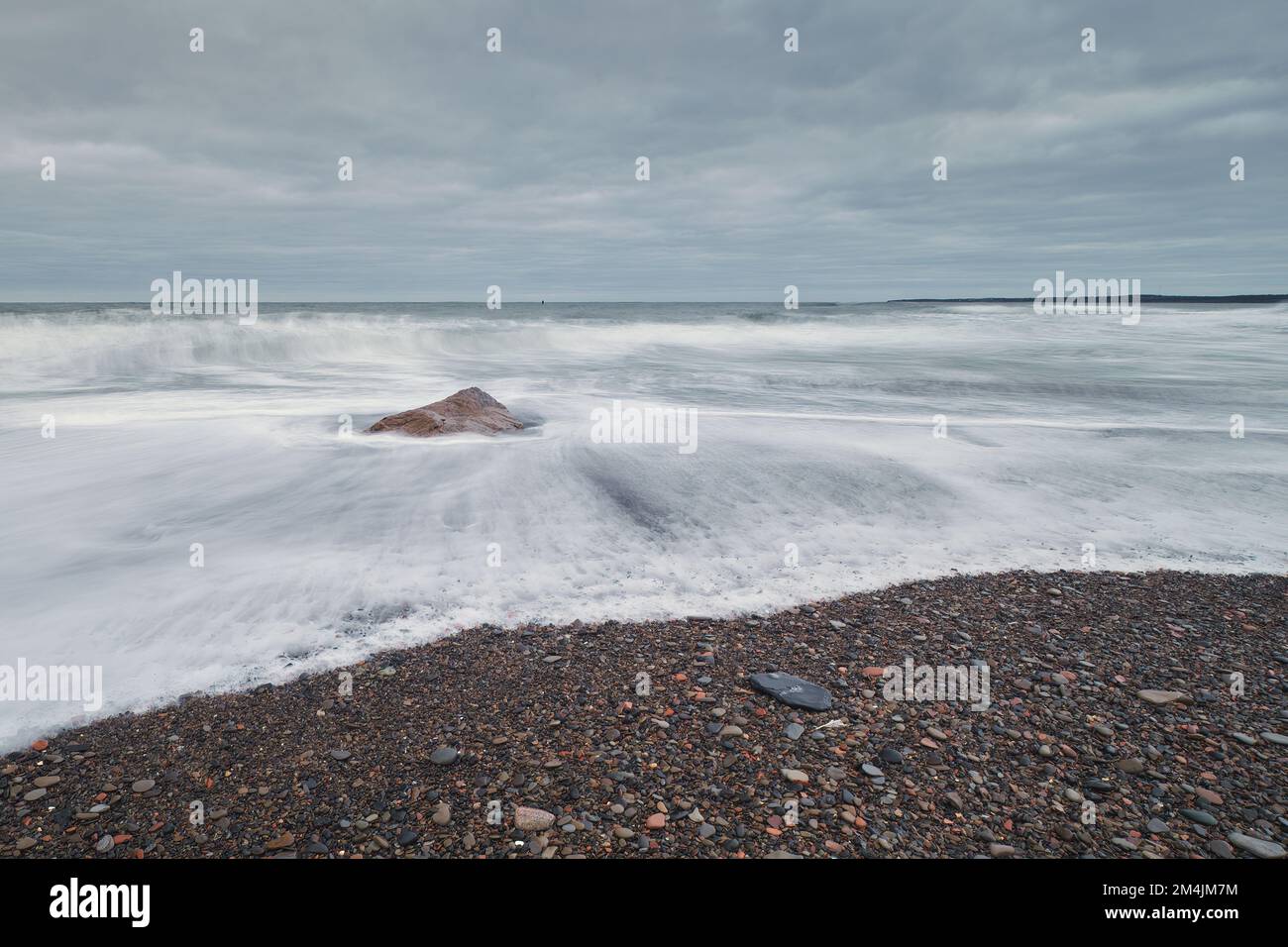 Surf washing on shore at Table Head Beach in Glace Bay a head of a