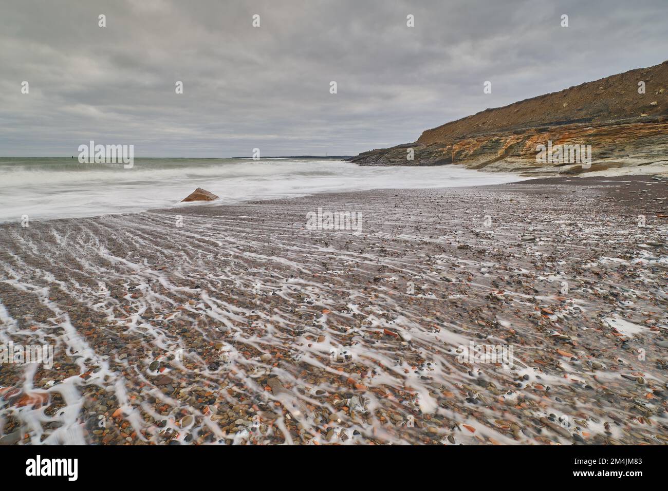 Surf washing on shore at Table Head Beach in Glace Bay a head of a