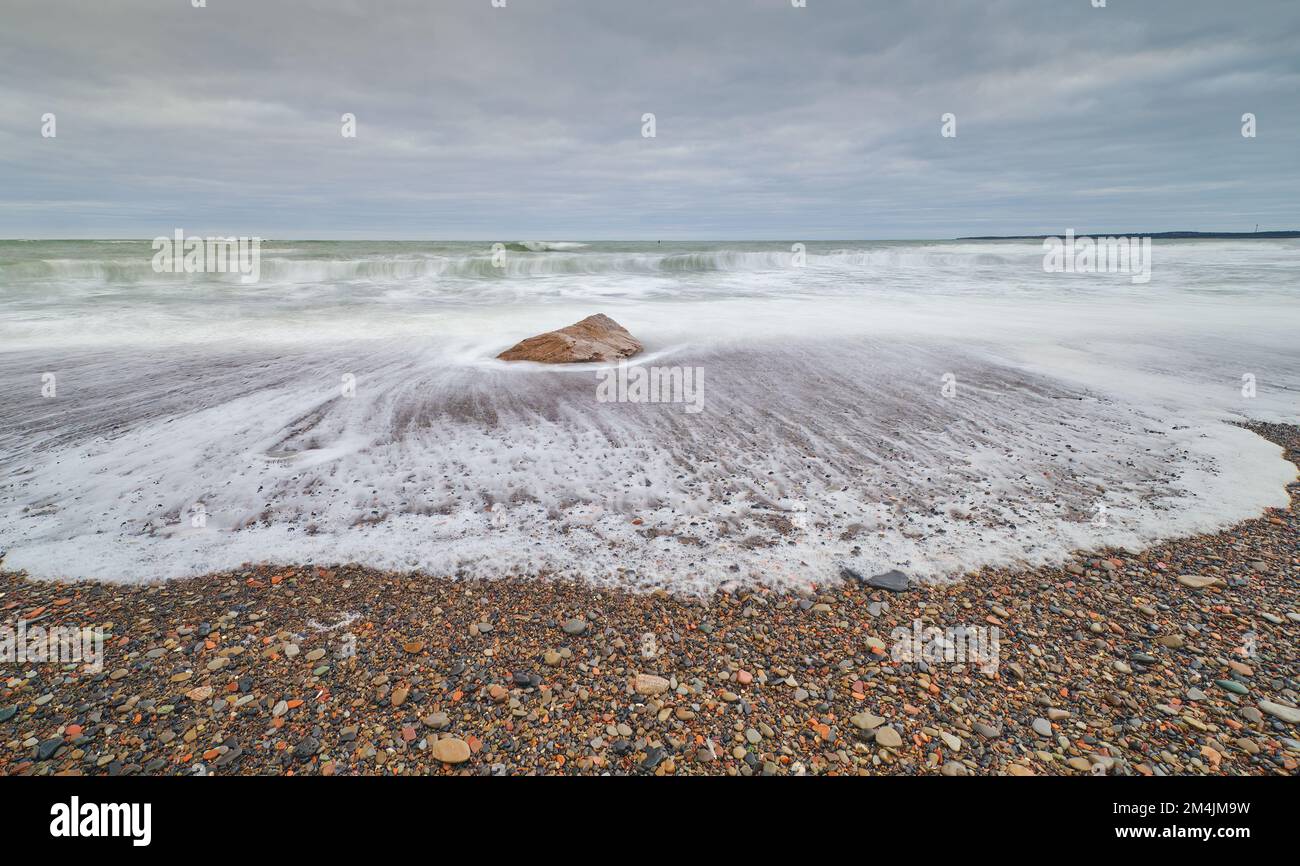 Surf washing on shore at Table Head Beach in Glace Bay a head of a